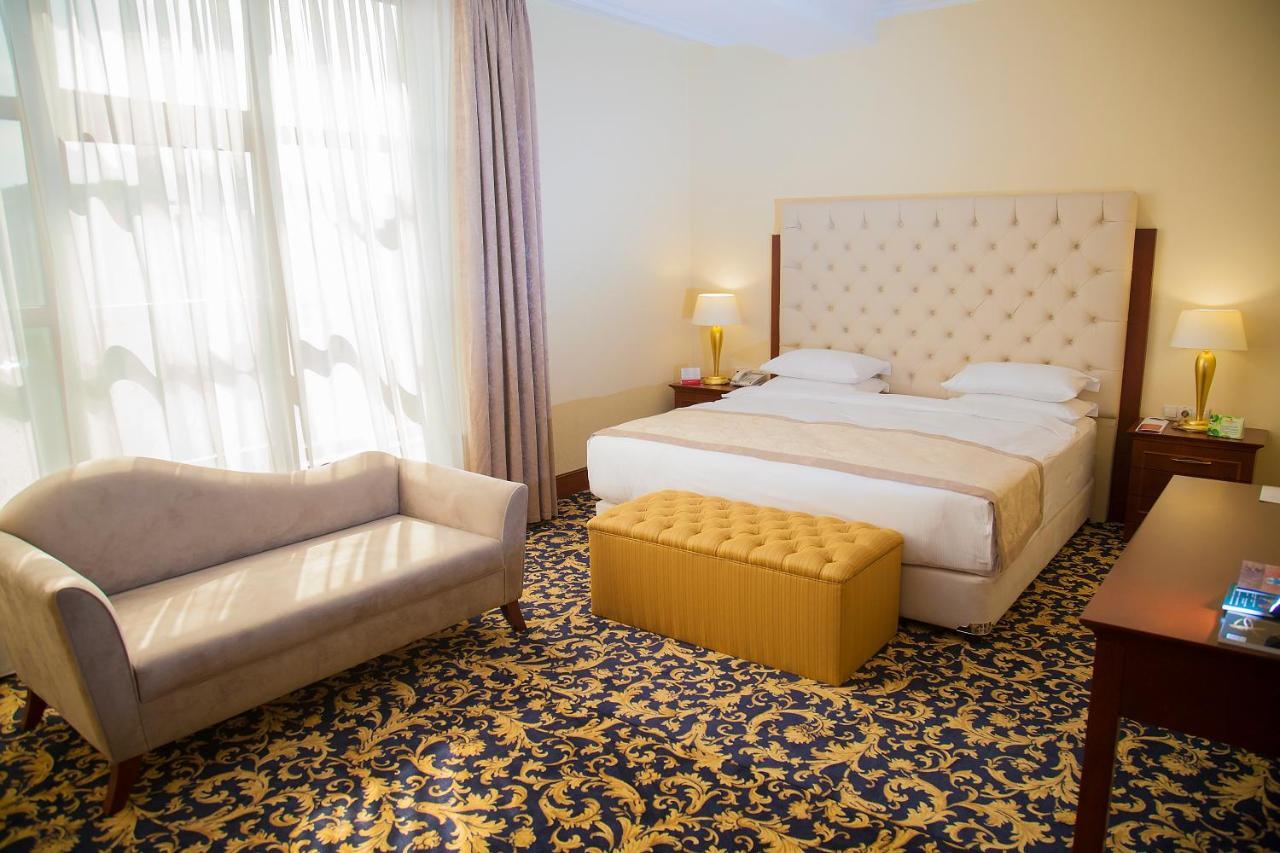 מלון Ramada By Wyndham אלמטי חדר תמונה